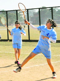 Players of GGDSD College in action during the Inter-College Ball Badminton Tournament at Panjab University in Chandigarh on Wednesday.