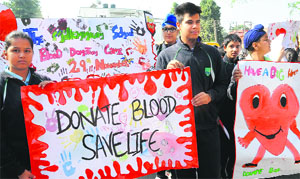 Students of Millennium School, Sector 67, Mohali, take out a rally to raise awareness about blood donation on Wednesday