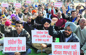 Members of the General Categories Welfare Federation (Punjab) hold a protest at Dasehra Ground, Phase VIII, in Mohali on Wednesday
