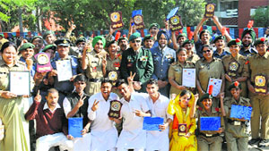 NCC cadets in a jubilant mood after receiving awards in Chandigarh on Wednesday.