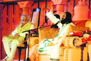Sri Sri Ravi Shankar and Haryana Chief Minister Manohar Lal Khattar during a programme at the Parade Ground in Sector 5, Panchkula, on Wednesday.
