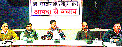 A workshop on disaster management underway at the Bachat Bhawan in Una on Wednesday