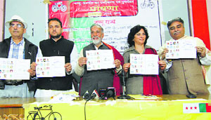 National Panthers Party leaders, led by Bhim Singh, release the party manifesto in Jammu on Wednesday.