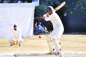 A batsman of Himalayan Cricket Academy plays a shot in a match in the Champion Cup Cricket at the Rangers College ground in Dehradun on Wednesday