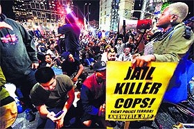  Protesters block an intersection in Los Angeles, California, on Tuesday night.