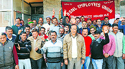 BSNL employees raise slogans in Mandi on Thursday