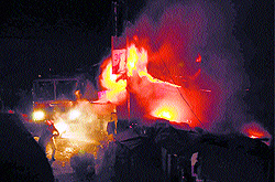 A fire in a market at Summer Hill Chowk in Shimla on Thursday