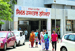 Visitors come out of the Civil Hospital in Ludhiana