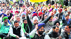 PSPCL employees protest in Ludhiana on Thursday