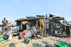 The wreckage of a British embassy vehicle after a suicide attack in Kabul on Thursday.