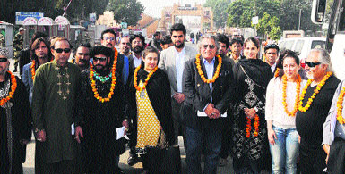 A delegation of artistes from Pakistan cross over to India through the Attari-Wagah Joint Check Post to a warm welcome to participate in Saanjh festival on Friday.