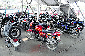 Two-wheelers parked on a railway station platform in Bathinda. 