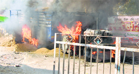 The tractor set on fire by a mob in Sirsa on Thursday.