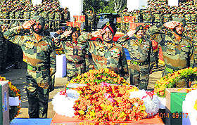 Lt Gen KJ Singh, GOC-in-C of the Western Command, pays tribute to soldiers killed in an encounter with militants in Arnia, at the Mamun Military Station, on Friday. 