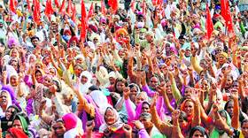 People attend a rally at the Grain Market in Ludhiana on Friday.
