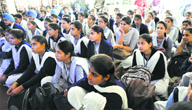 Students watch poet Surjit Patar during the EDUSAT programme at Government Senior Secondary Model School at the PAU in Ludhiana on Friday.