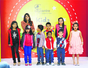 Kids pose on the ramp during the show