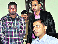 A Nigerian citizen accused of money fraud presented by the STF team in Dehradun on Friday