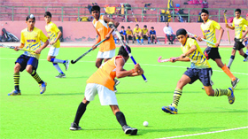 A hockey match in progress between Ferozepur and Patiala during a hockey championship in Bathinda on Saturday.