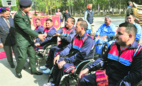 Maj Gen RS Rathore, MG AOC, HQ Western Command, meets inmates of the Paraplegic Rehabilitation Centre in Mohali on Saturday.