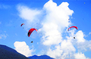 Paragliders take a flight at Solang in Manali.