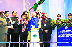 Prime Minister Narendra Modi digitally flags off the first train to Meghalaya at a function in Guwahati on Saturday