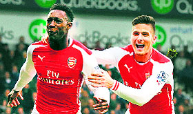 Arsenals Danny Welbeck celebrates with Olivier Giroud after scoring a goal against West Bromwich Albion on Saturday. 