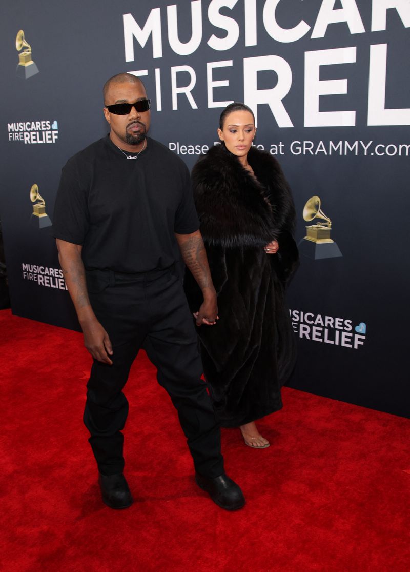 bianca censori grammy dress singing (?) an Adele tune at a after party & later packing on the PDA with Kanye West @backgrid_usa Kanye West Applauds "Brave" Wife